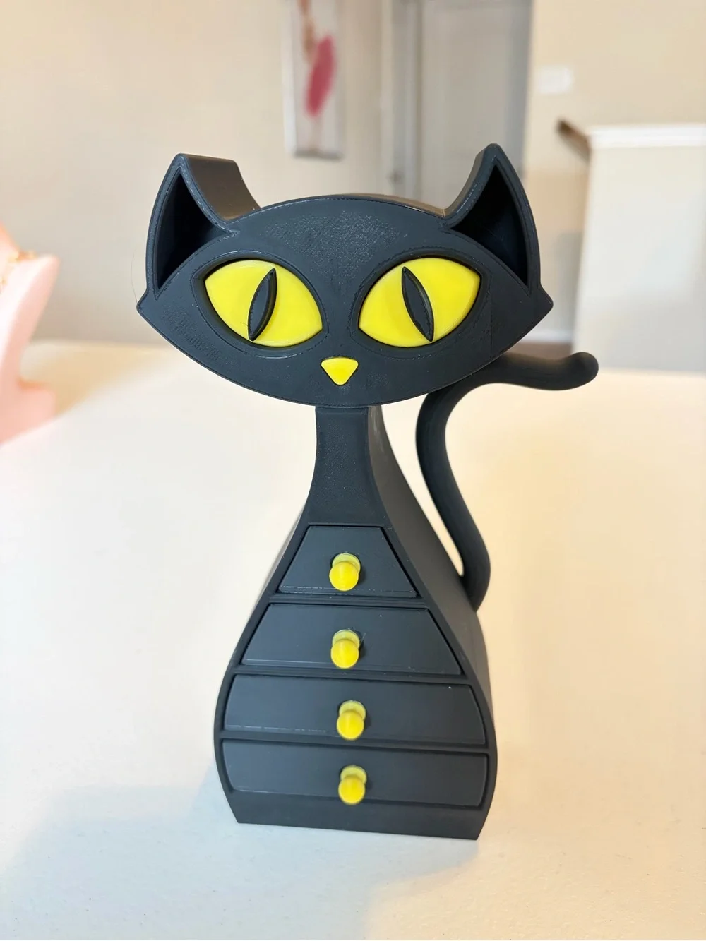 3D Printed Black & Yellow Cat Jewelry Organizer.